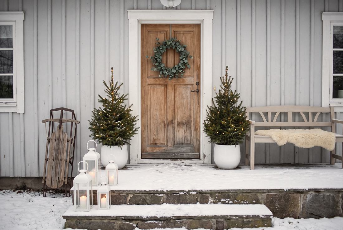 A Scandinavian porch in snowy daylight.